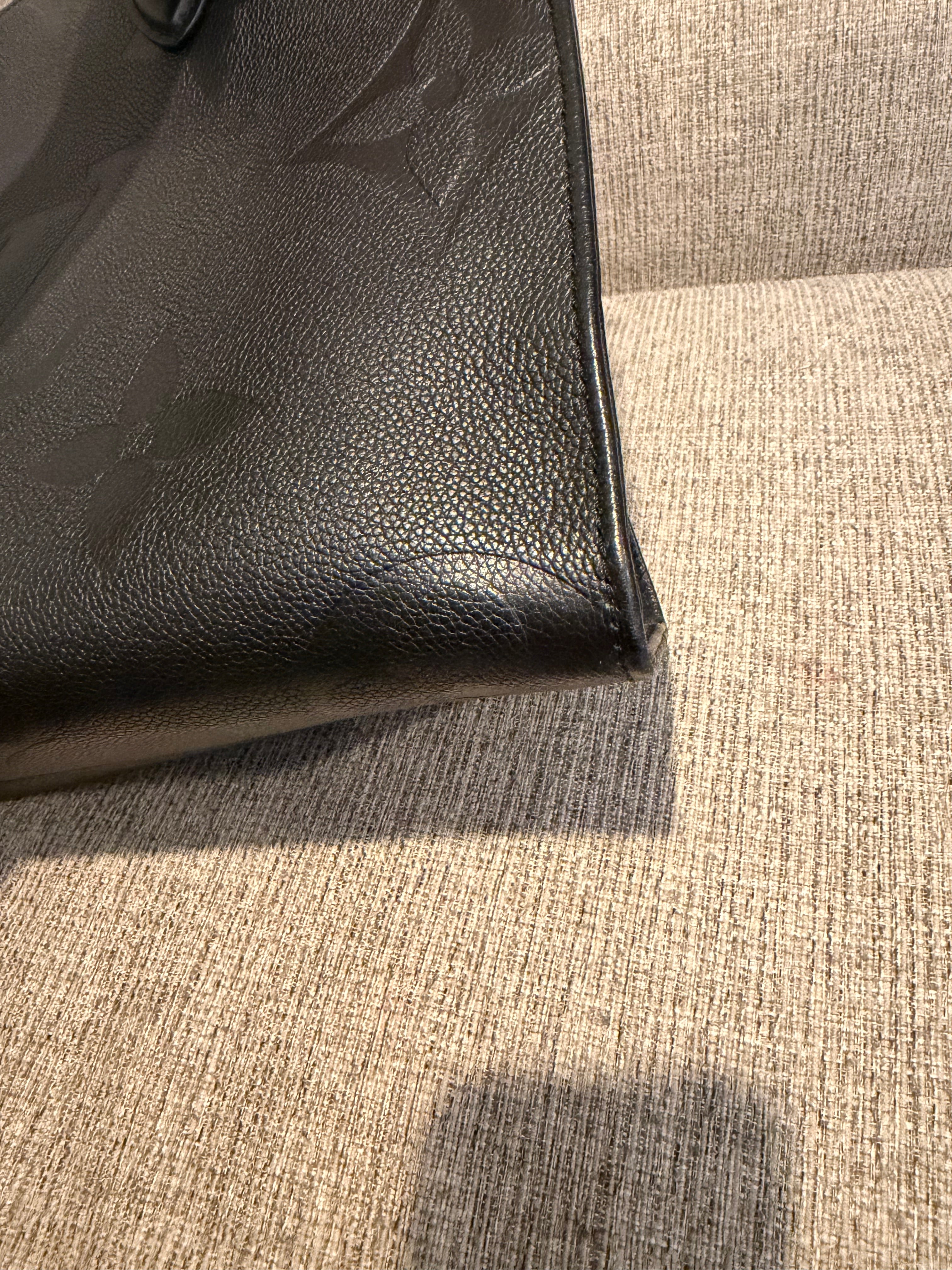 LV OTG MM Black Empreinte