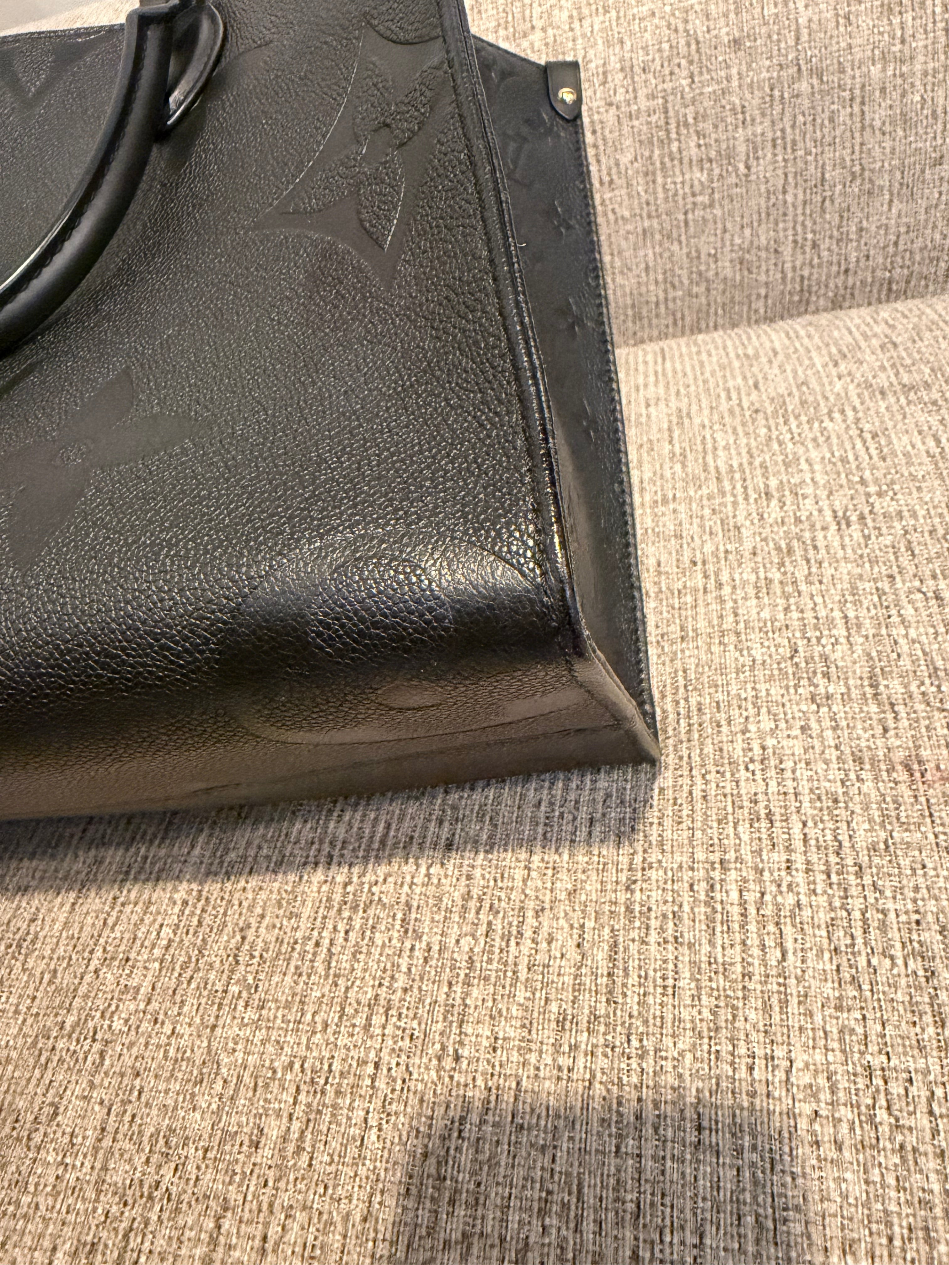LV OTG MM Black Empreinte