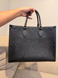 LV OTG MM Black Empreinte